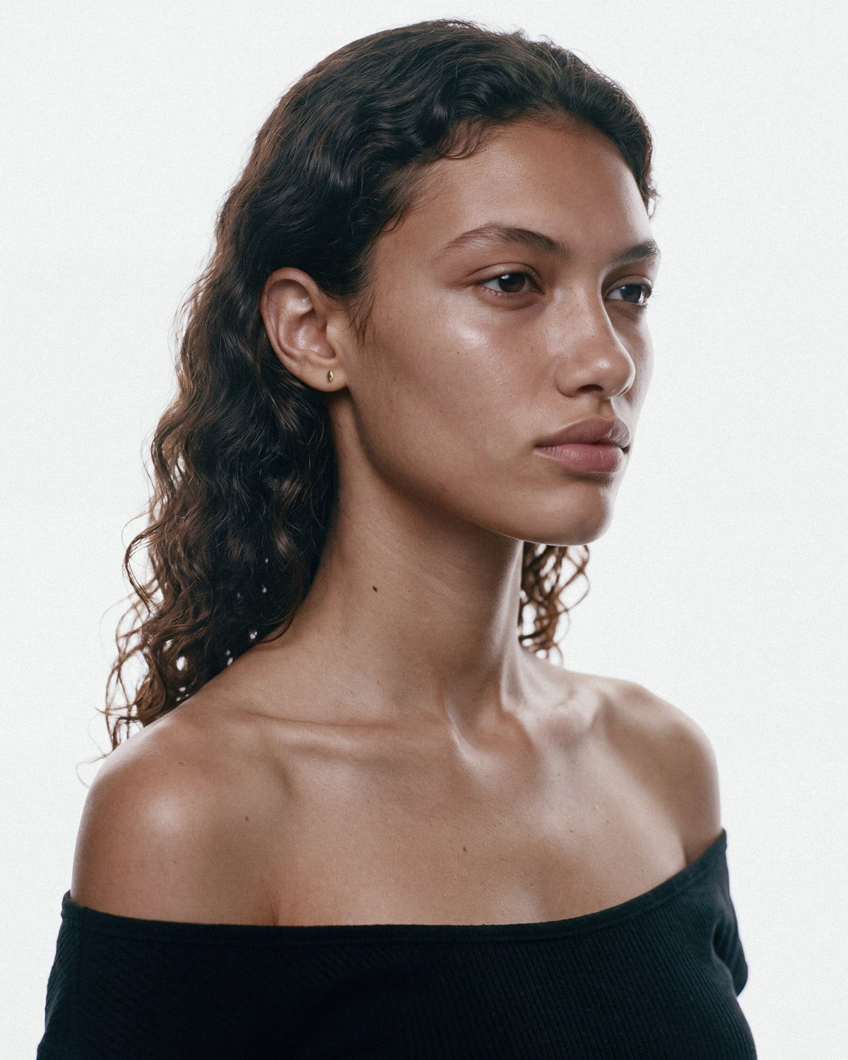 SAGA Anchor Stud in Gold, worn by a model, for COLD SKIN.