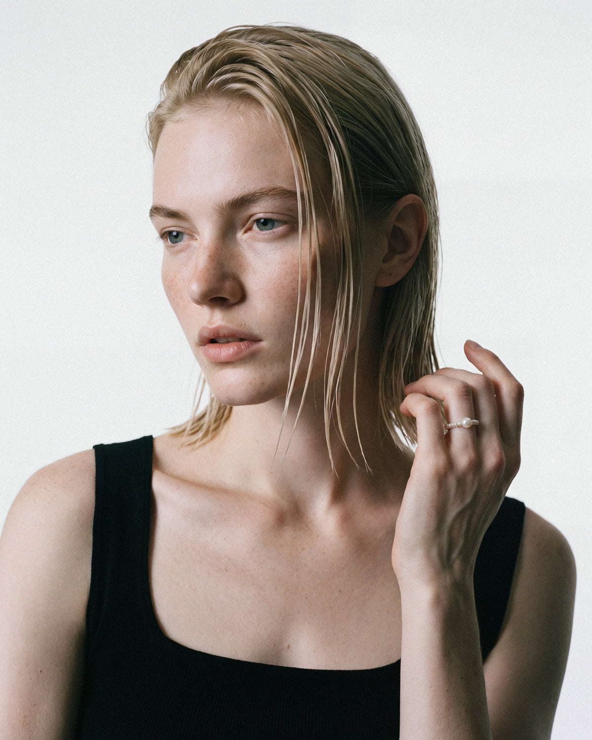 PEARL NAKED Bubble Ring in White, worn by a model, for COLD SKIN.