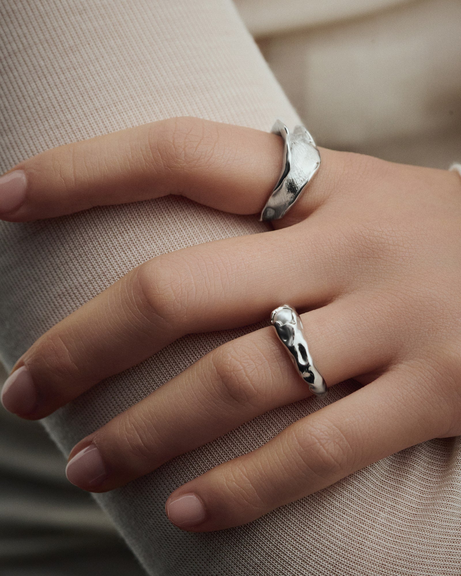 Female model wearing Baixa Ayla Pearl Ring and Baixa Sarah Ring in silver.