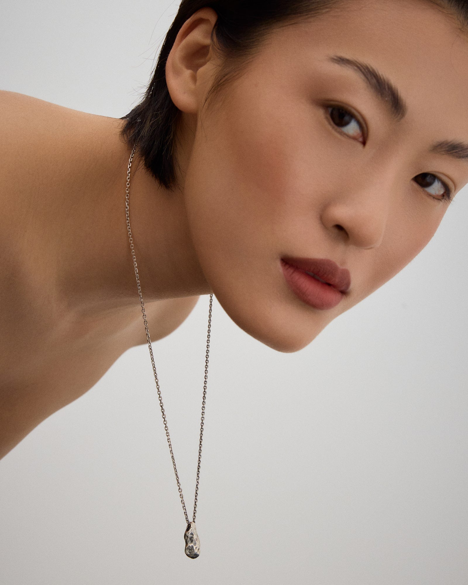Female model wearing Seaster Stone Necklace