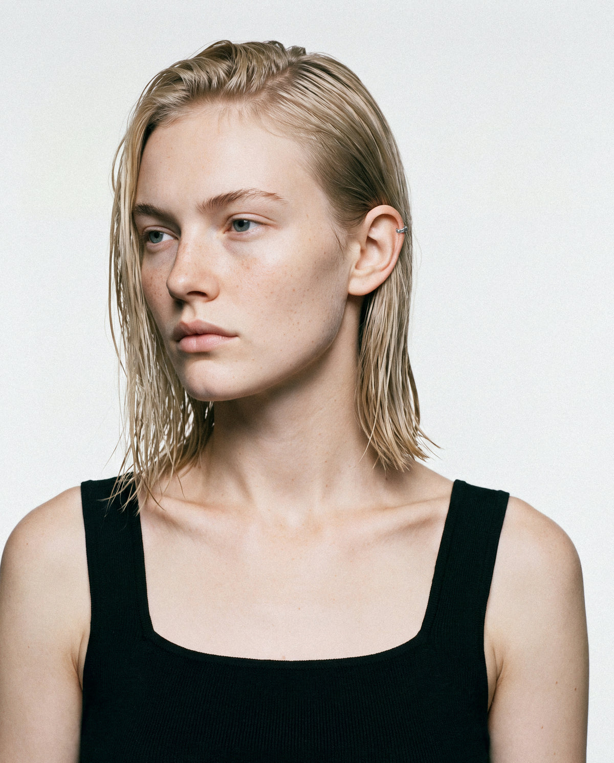Model wearing the Raw Ear Cuff Mini - Silver