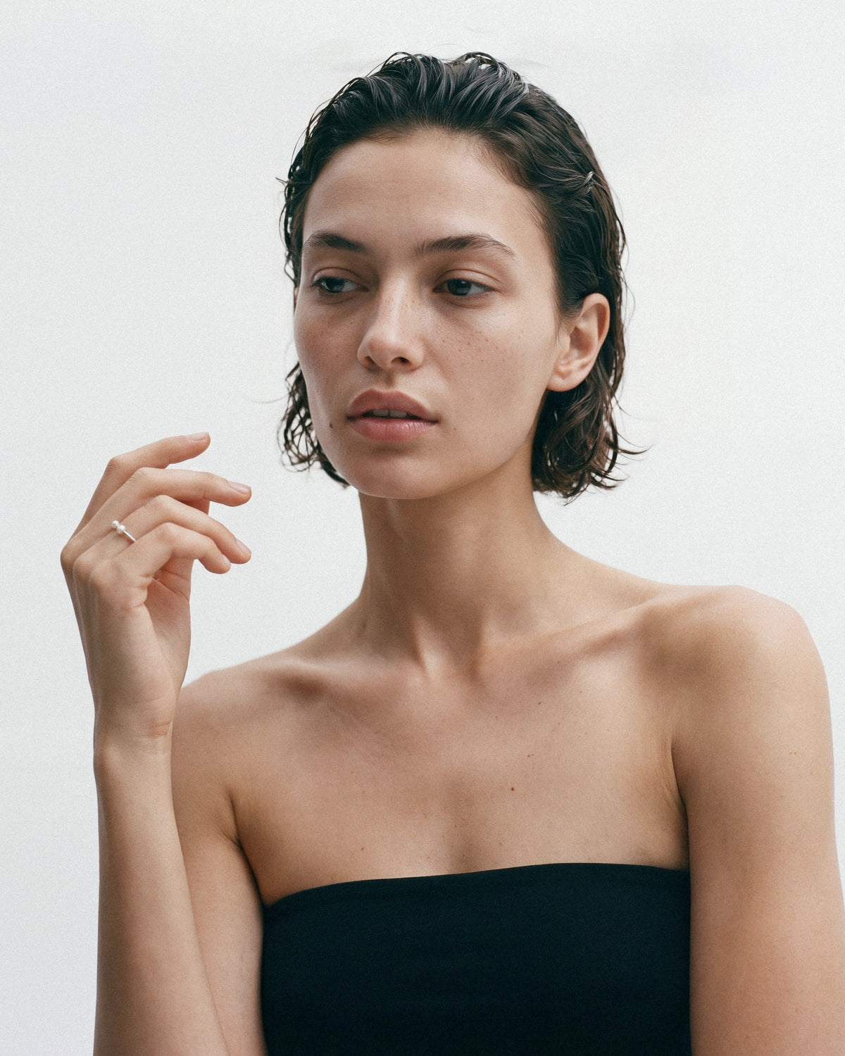 PEARL NAKED Crab Eye Ring in Silver & White, worn by a model, for COLD SKIN.