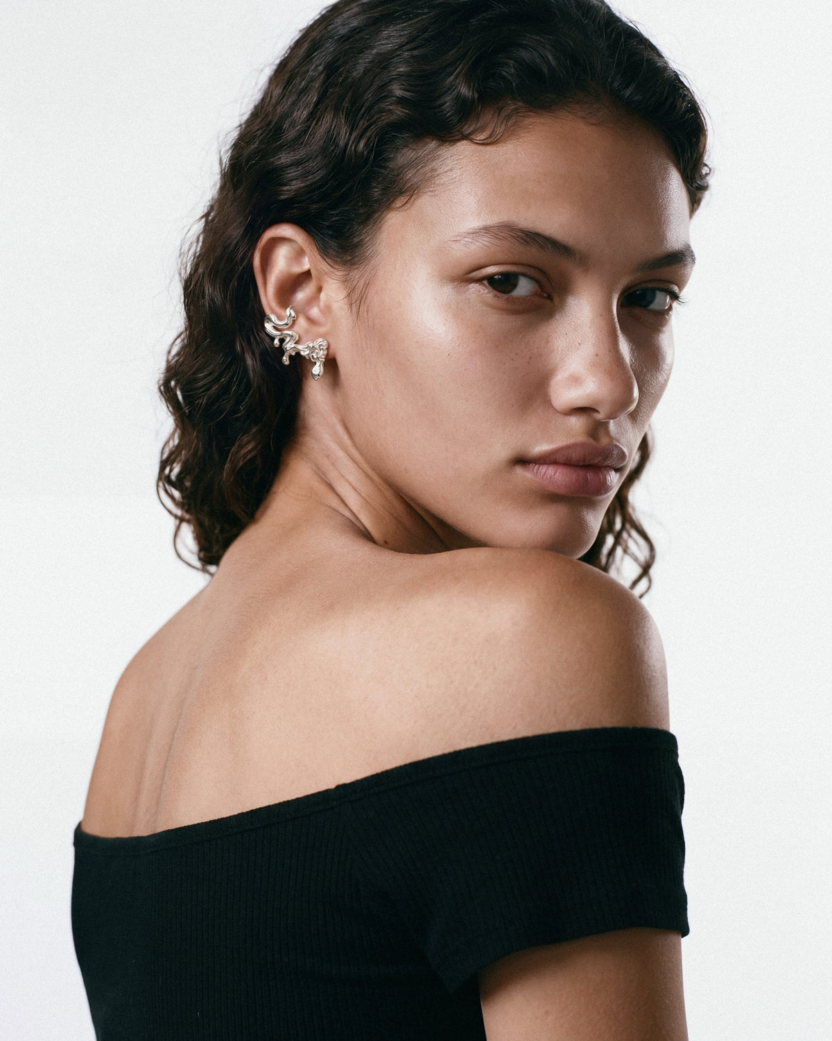 Louis Abel Umor Ear Climber in Silver, worn by a model, for COLD SKIN.