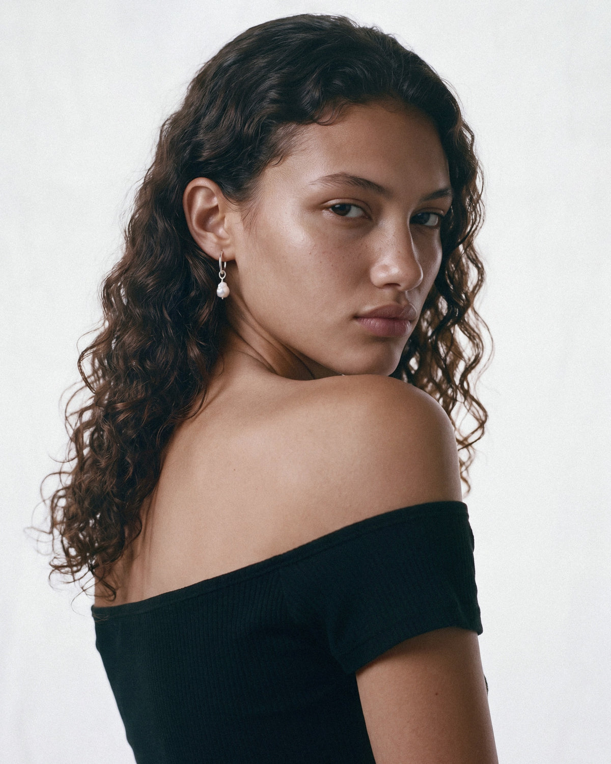 PEARL NAKED Mermaid Tear Earrings in Silver & White, worn by a model, for COLD SKIN.