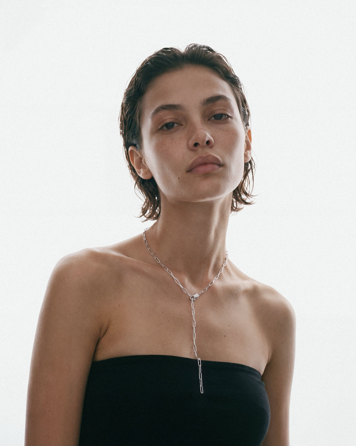 NO MORE Paper Clip Y-Necklace in Silver, worn by a model, for COLD SKIN.