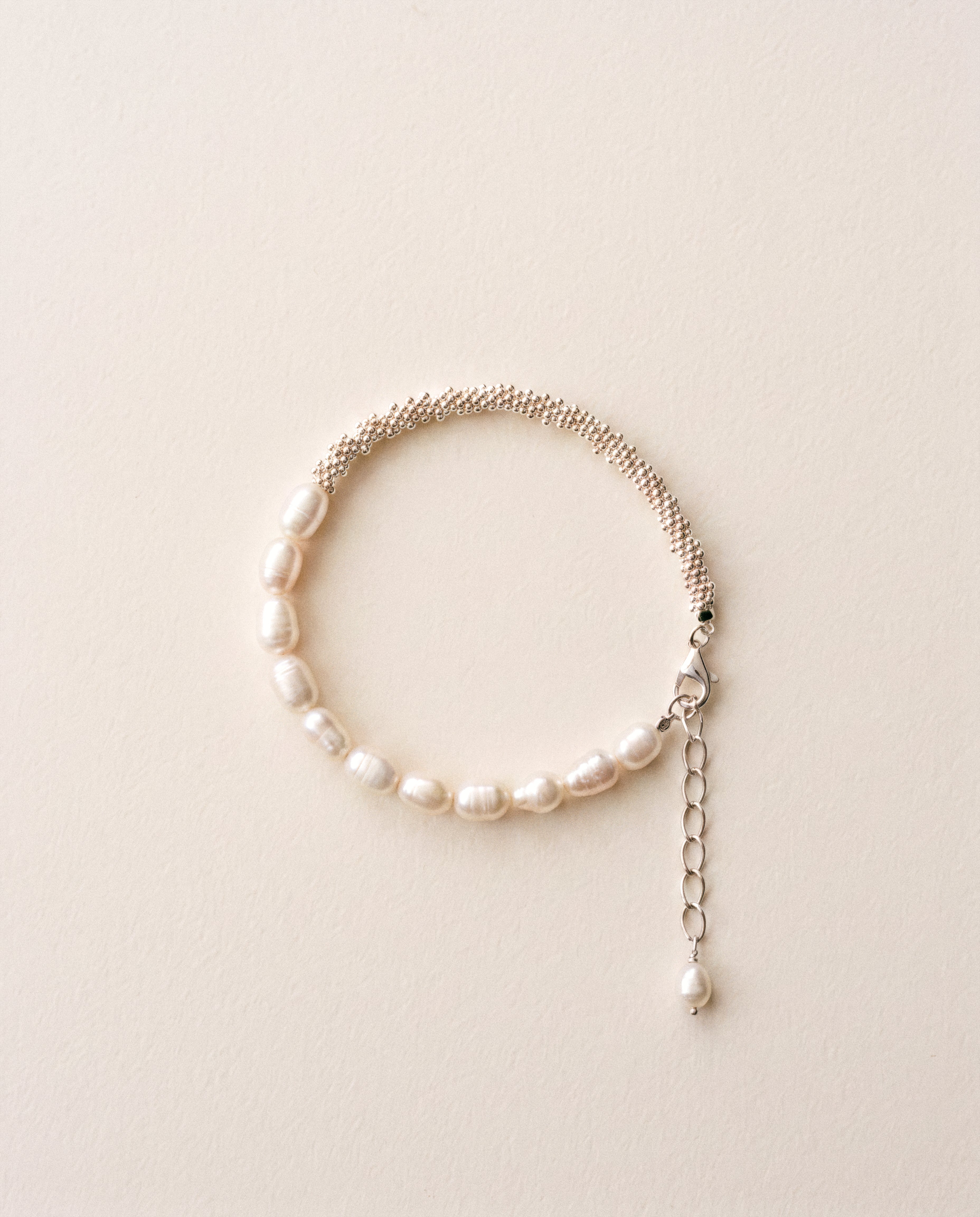 Close-up of Pearl Naked Calypso Bracelet in silver.