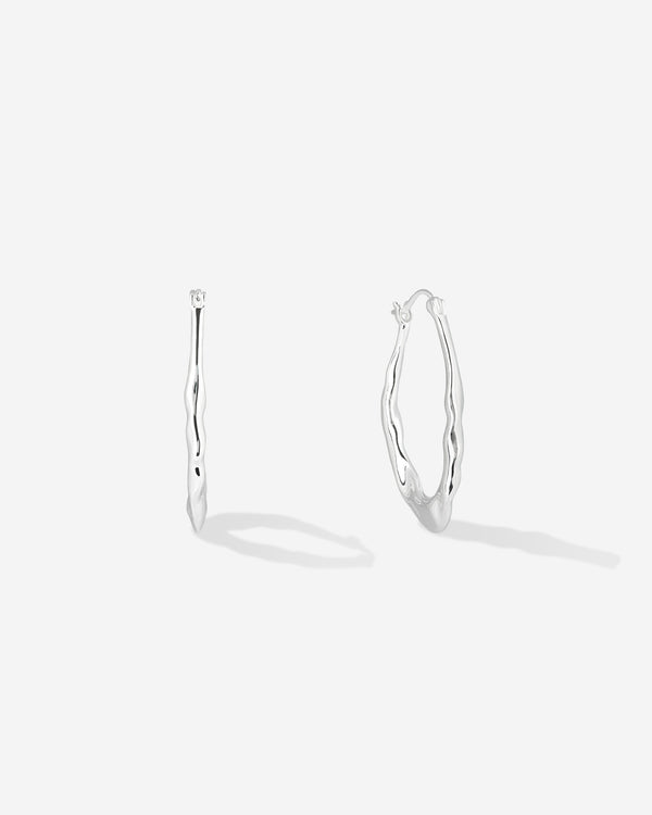 Baixa Dalia Hoops in silver.