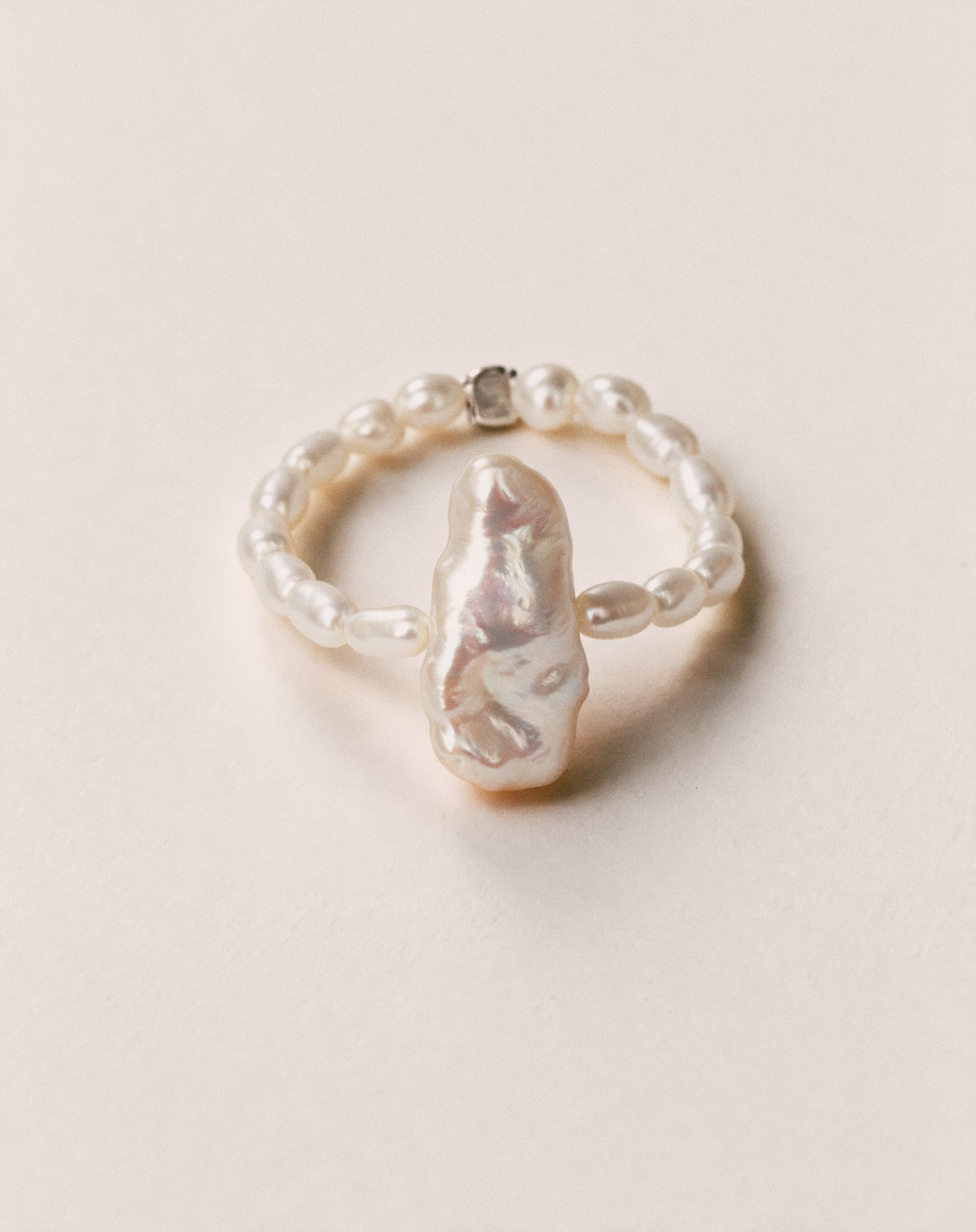 Close-up of the Pearl Naked August Ring, photographed for COLD SKIN