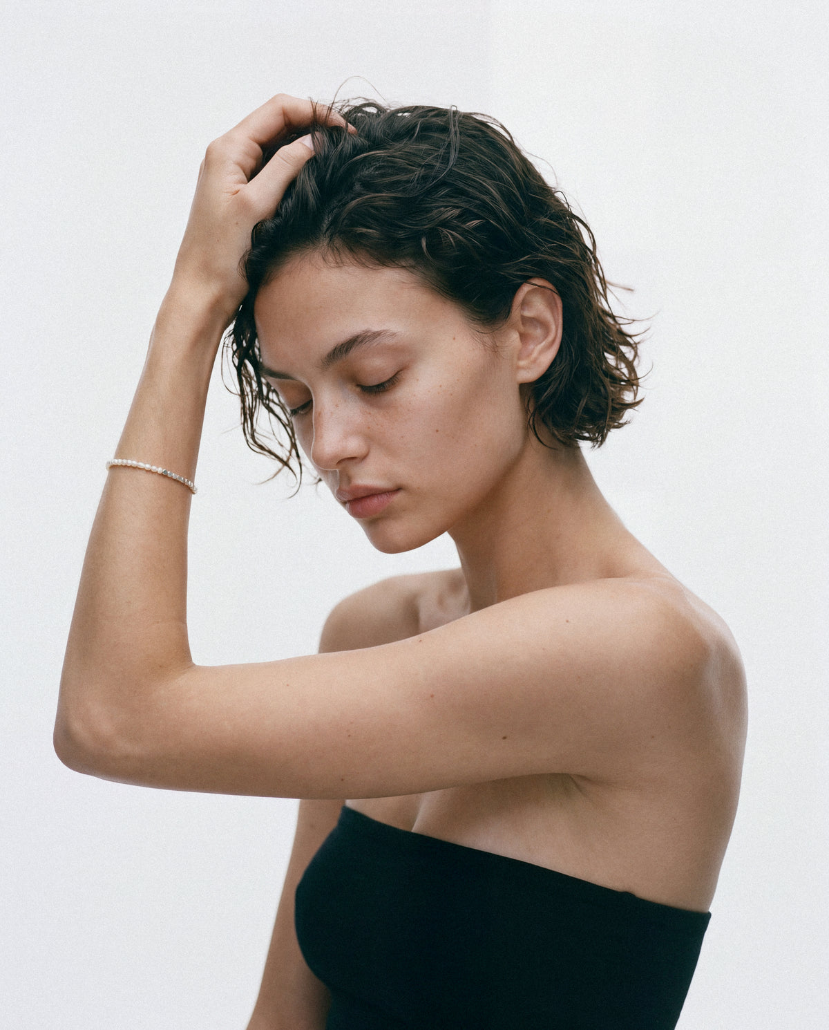 Model wearing the Mid Tide Bracelet - Silver & Pearl
