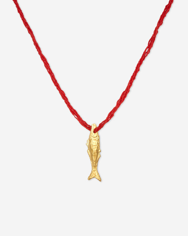 Close-up of Éclis Oona fish Amulet in gold