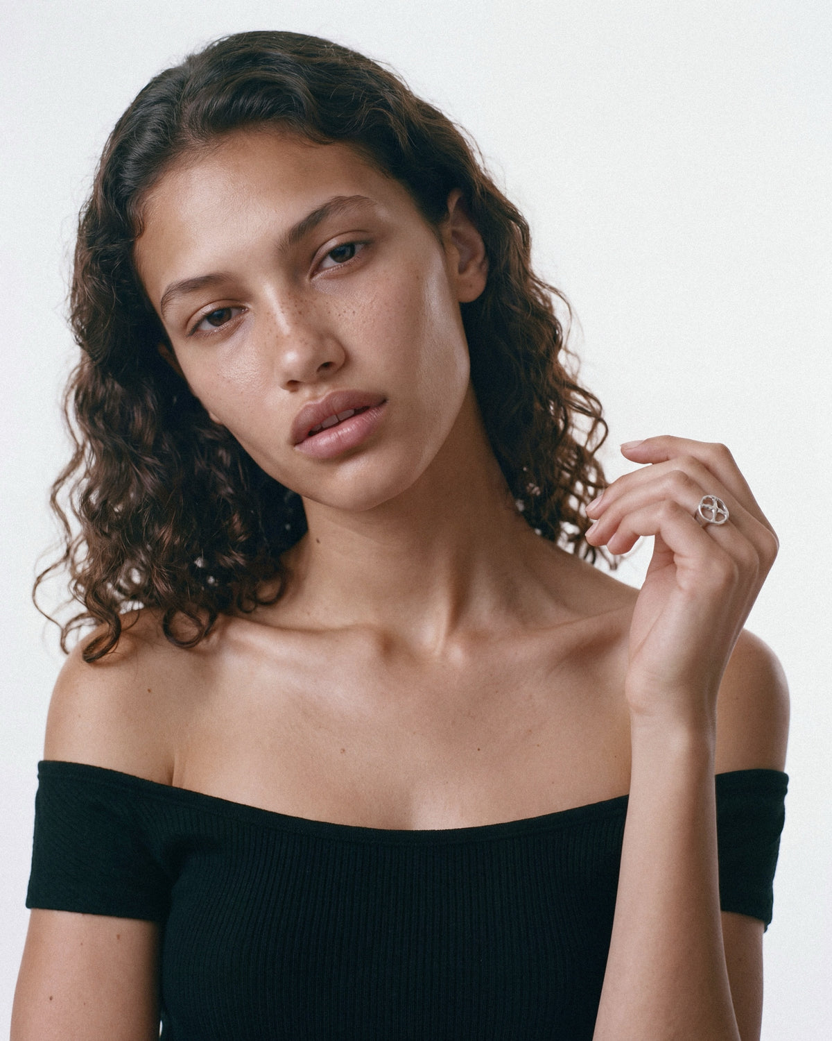STRUGA Fused Cross Ring in Silver, worn by a model, for COLD SKIN.