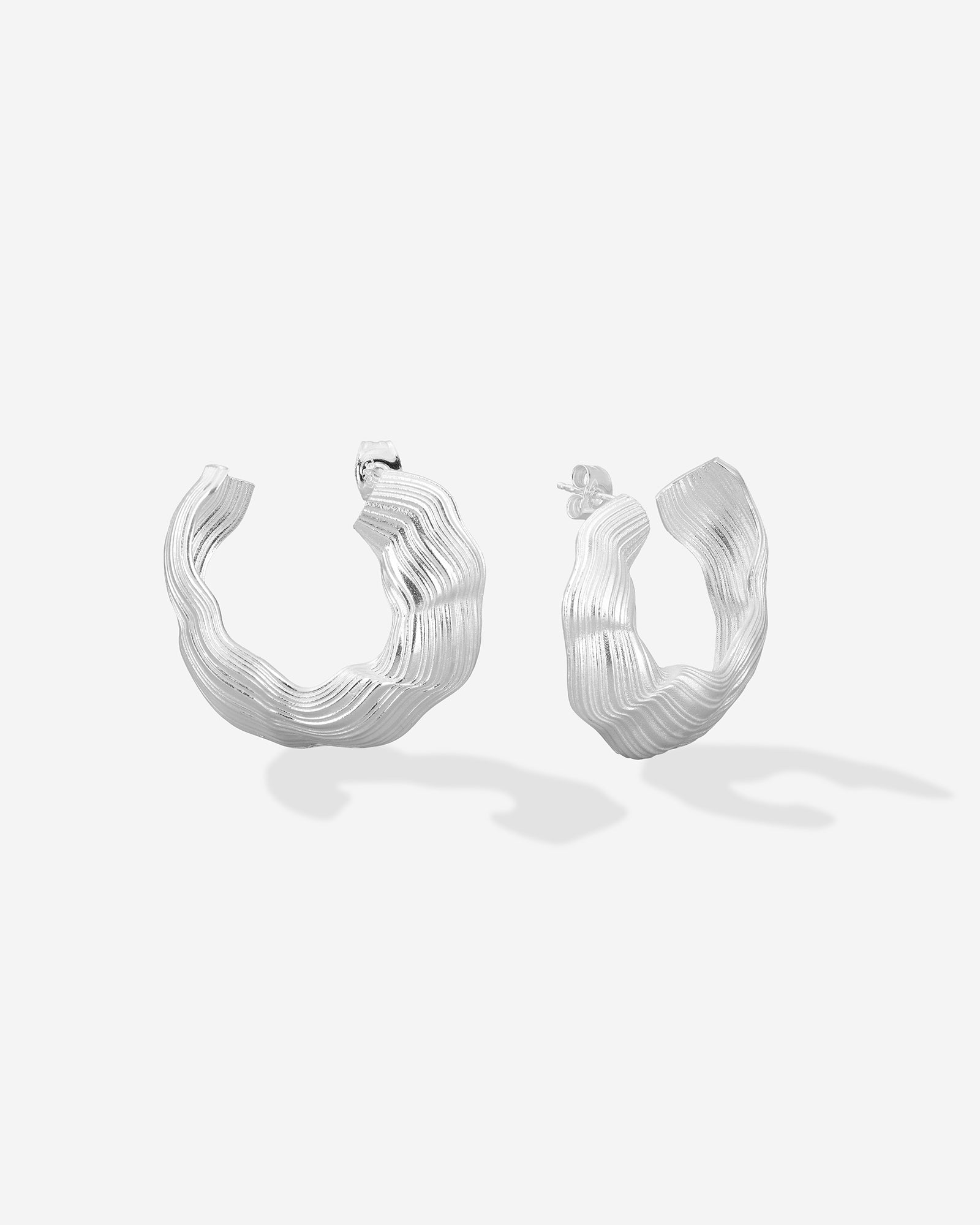Louis Abel Abluvio Earrings in Silver.