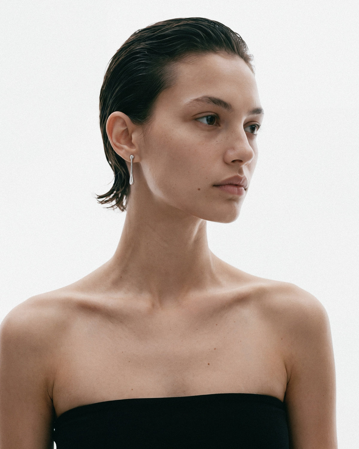 Louis Abel Cadendo Earrings in Silver, worn by a model, for COLD SKIN.