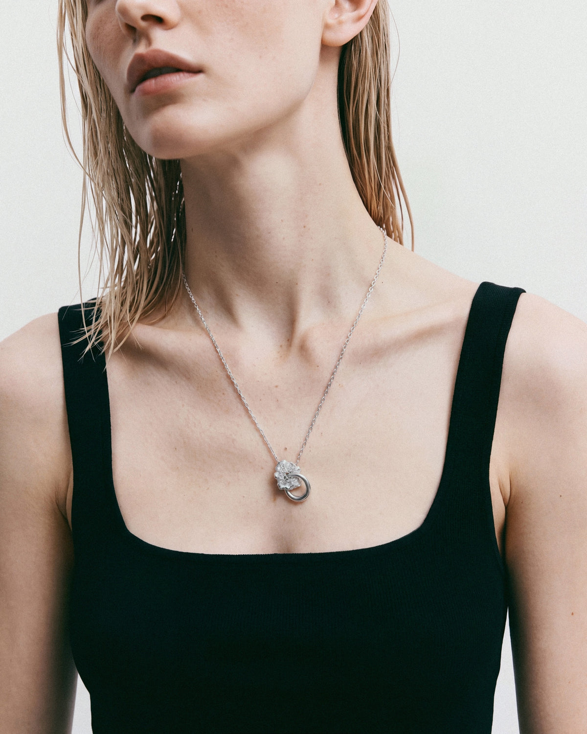 NO MORE Forever Raw Necklace in Silver, worn by a model – close-up, for COLD SKIN.