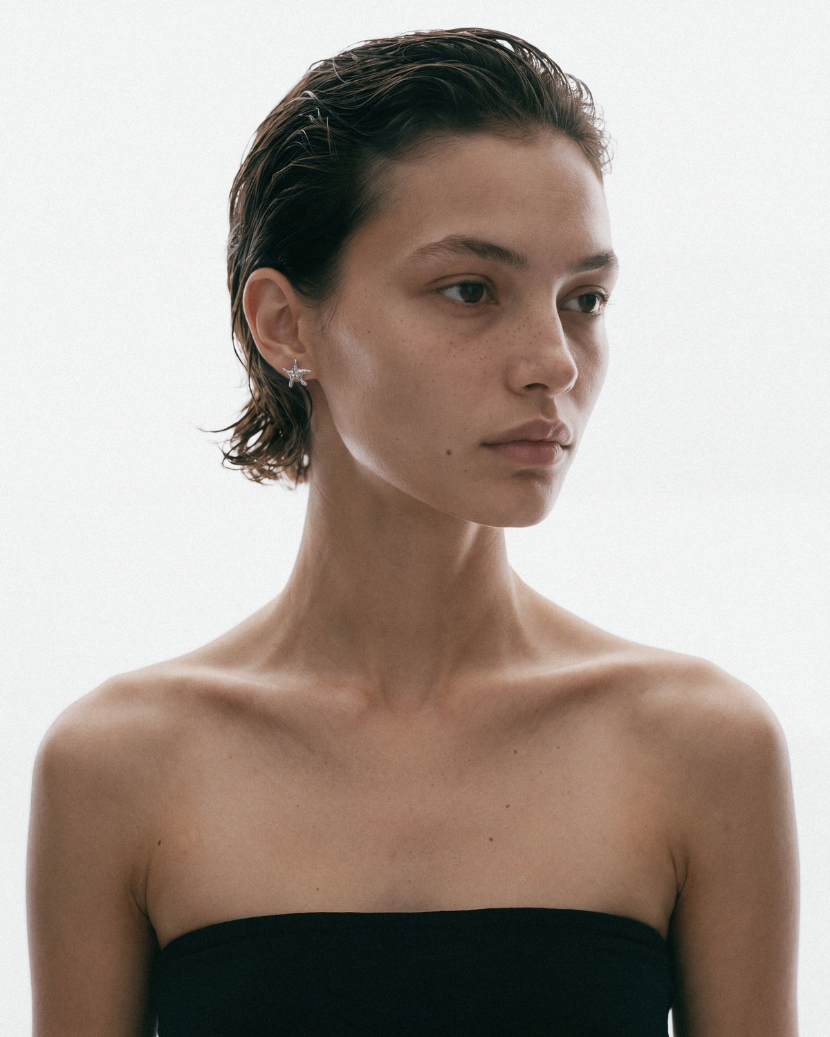 NO MORE Sea Star Earrings in Silver, worn by a model, for COLD SKIN.
