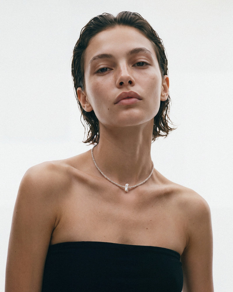 PEARL NAKED Reef Pearl Choker in Silver & White, worn by a model, for COLD SKIN.